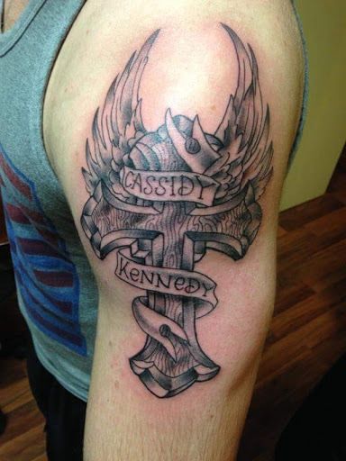 Explore leg tattoo idea for men, creative tattoo ideas in Cheyenne, available at The T.R.I.B.E. Zoo, LLC Tattoo