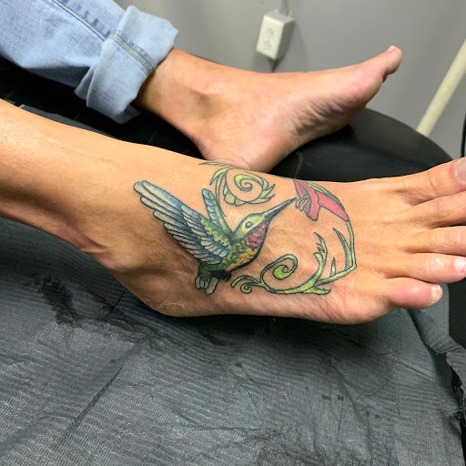 Explore small flower tattoo ideas, creative tattoo ideas in Hudson Falls, available at ALTERED ADDICTION TATTOOS