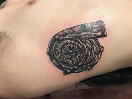 Explore top of hand tattoo ideas, creative tattoo ideas in Seymour, available at American Gypsy Tattoo Corp.