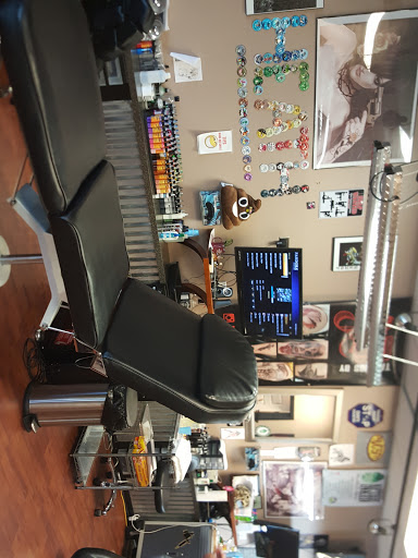 Explore singer tattoo ideas, creative tattoo ideas in Auburndale, available at Soldiers Of Ink