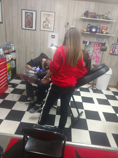 Explore floral hand tattoo ideas, creative tattoo ideas in Hastings, available at Black Diamond Tattoo