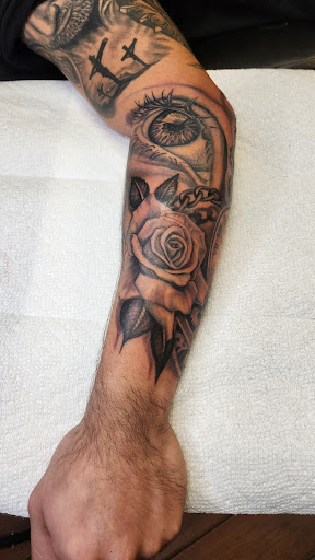 Explore west virginia tattoo ideas, creative tattoo ideas in Stuart, available at Tiger Shark Tattoo Studio