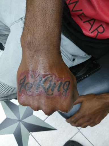 Explore arm blackout tattoo ideas, creative tattoo ideas in Hampton, available at Blue Horseshoe Tattoo and Body Piercing