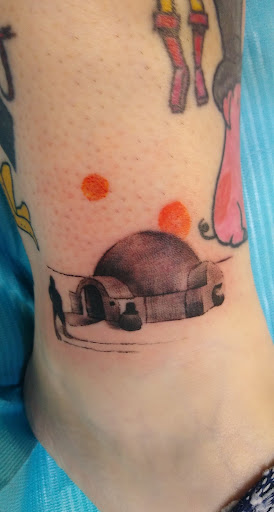 Explore state tattoo ideas, creative tattoo ideas in Mason City, available at Technicolor Tattoo Studio