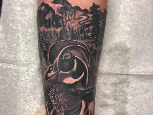 Explore wedding band tattoo ideas for him, creative tattoo ideas in Magnolia, available at Tanner Tattoos