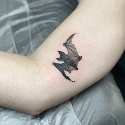 Explore mic tattoo ideas, creative tattoo ideas in Austin, available at Copperhead Tattoo & Piercing