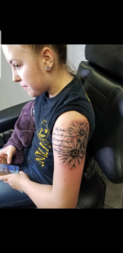Find small cat tattoo ideas for your next unique tattoo in Richmond at Captured Moment Tattoos
