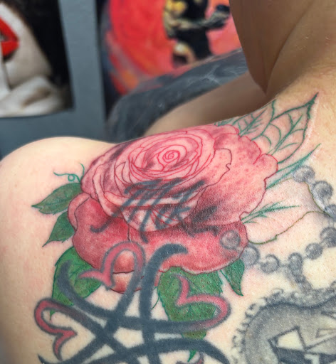 Explore tattoos ideas for men cross, creative tattoo ideas in San Antonio, available at Twisted Tattoo