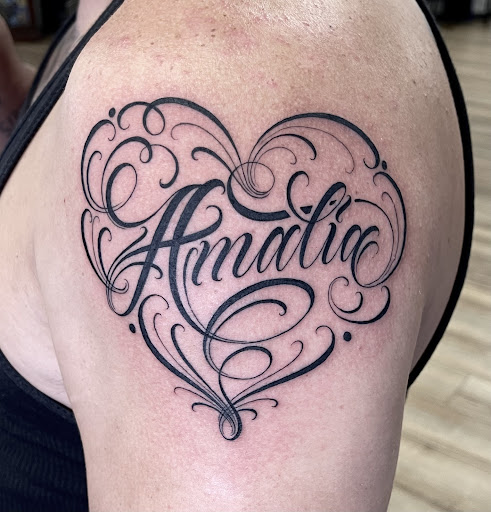 Explore tattoo filler ideas for guys, creative tattoo ideas in Whiting, available at Lucky Kat Tat