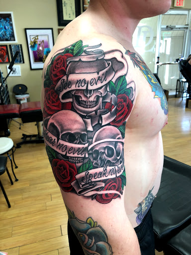 Explore black flower tattoo ideas, creative tattoo ideas in Liberty, available at Dark Lotus Tattoo & Salon
