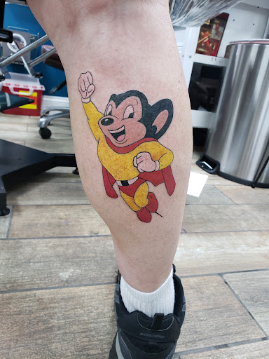 Explore deceased dog tattoo ideas, creative tattoo ideas in Buford, available at Wild Tribe Tattoos and Piercings
