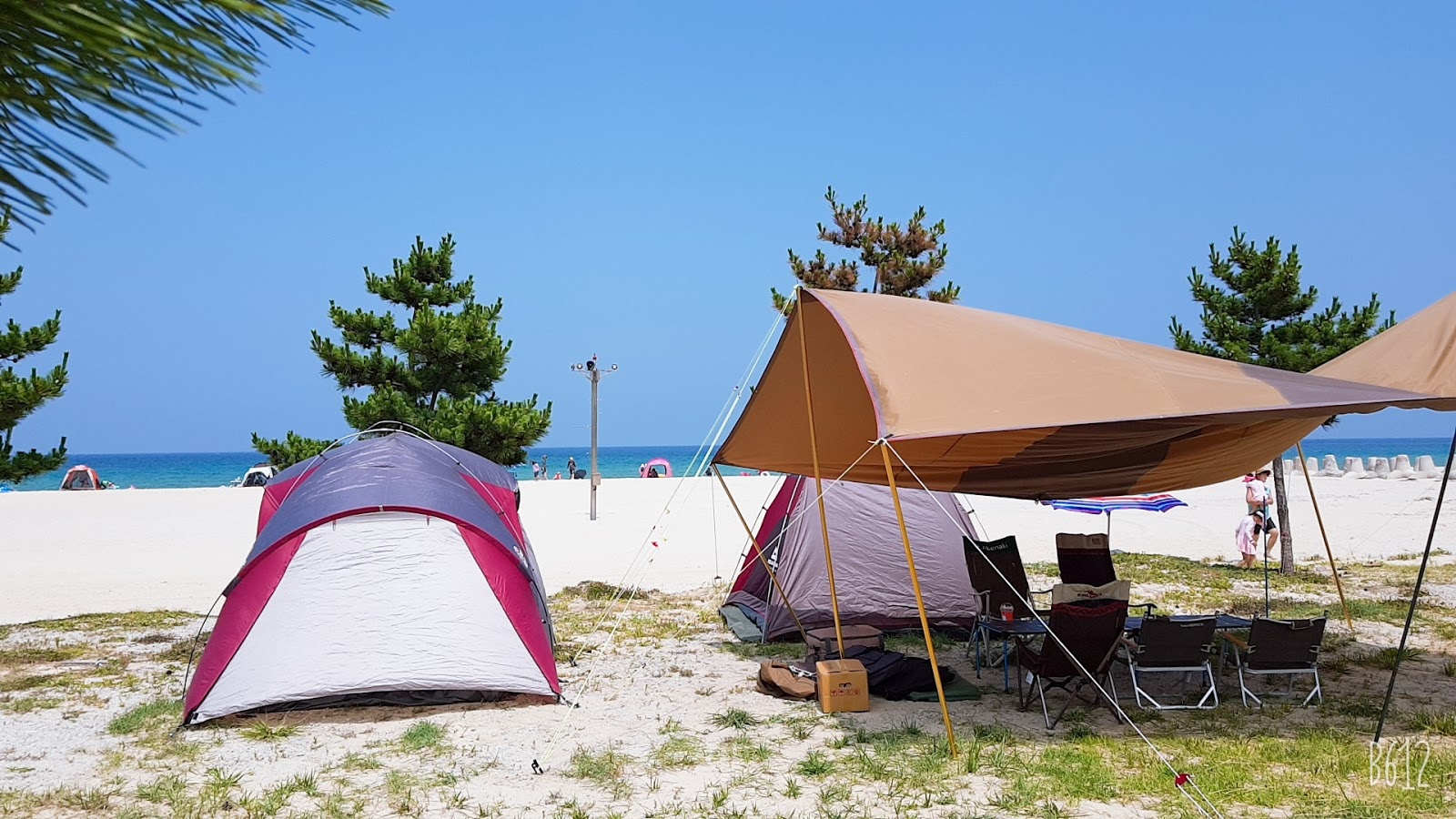 Fotografie cu Sampo Beach - locul popular printre cunoscătorii de relaxare