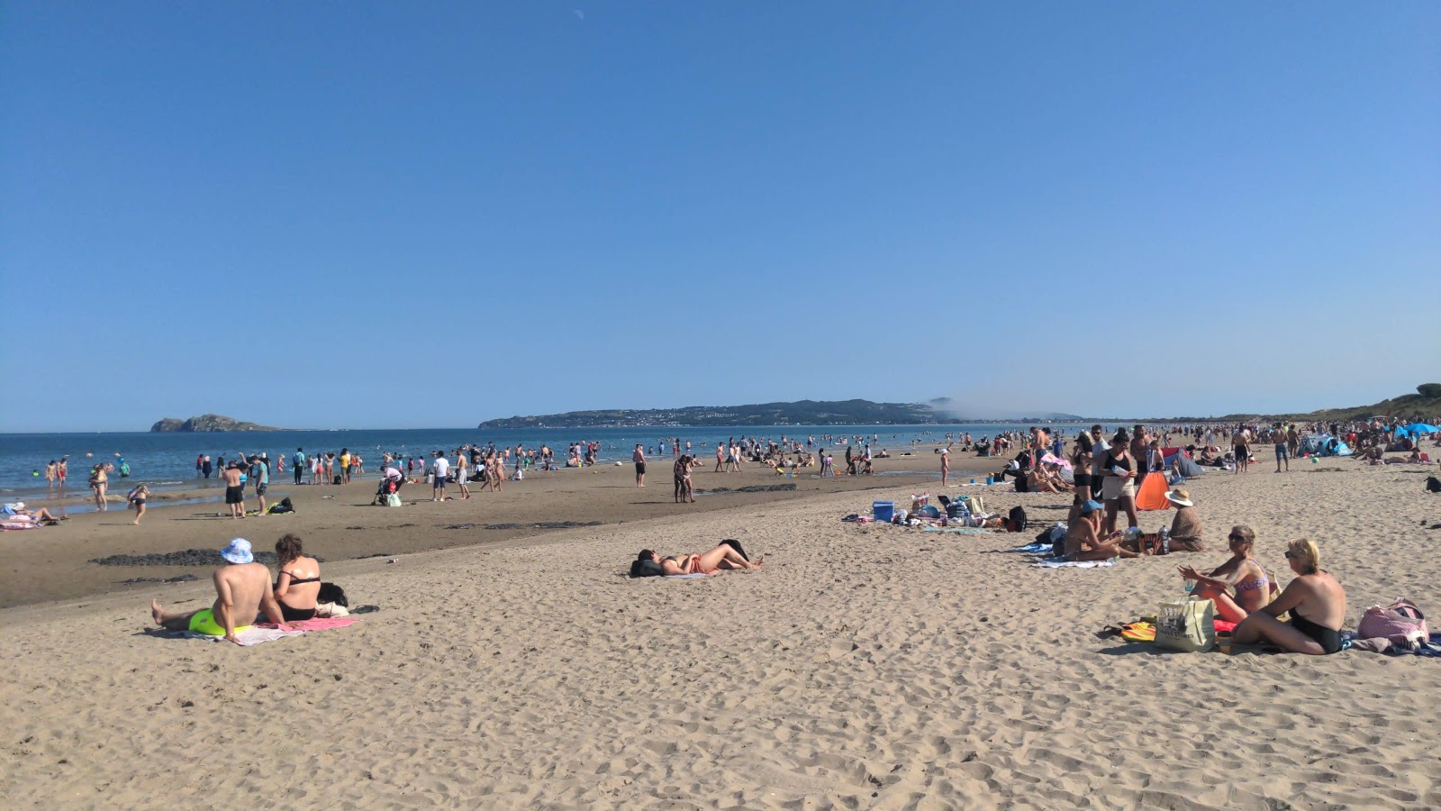 Portmarnock Beach'in fotoğrafı - rahatlamayı sevenler arasında popüler bir yer