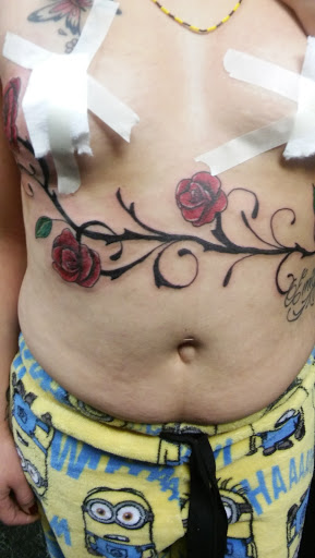 Explore mens angel tattoo ideas, creative tattoo ideas in Big Spring, available at A Mom & Pop Tattoo Shop