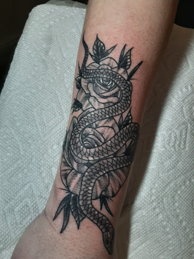 Explore clock tattoo ideas for men, creative tattoo ideas in Lakeview, available at Backwoods Tattoo Studio