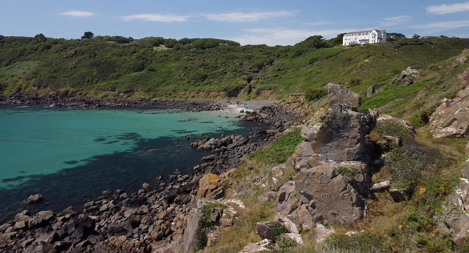 Photo of Porthbeer Cove with small bay