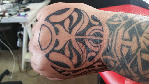 Tattoo Shop «Divine Torture», reviews and photos, 3223 Curry Ford Rd, Orlando, FL 32806, USA