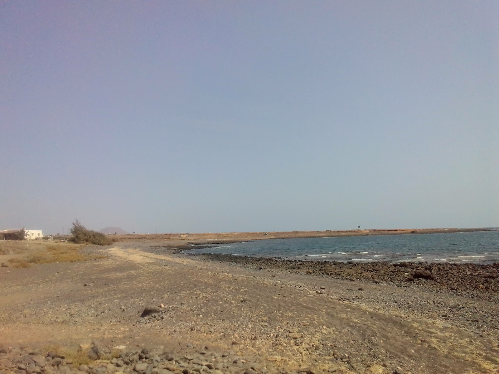 Foto van Playa de Barlovento met stenen oppervlakte