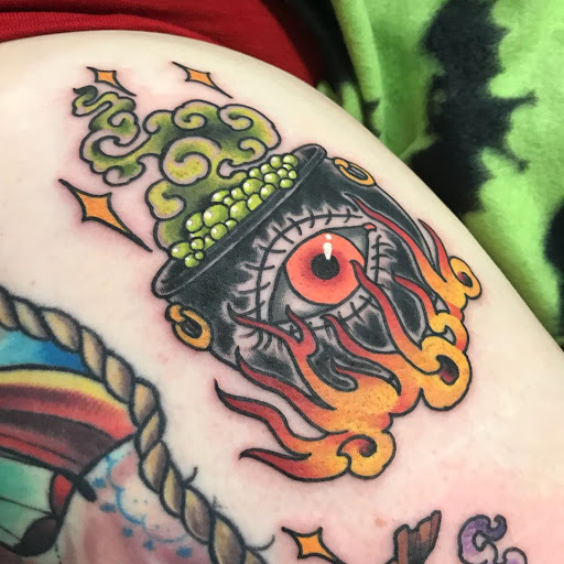 Explore seashell tattoo ideas, creative tattoo ideas in Clinton, available at Black Relic Tattoo