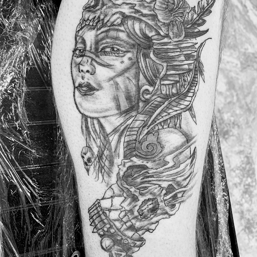 Explore women's arm tattoo ideas, creative tattoo ideas in Seymour, available at American Gypsy Tattoo Corp.