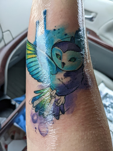Explore snoopy and woodstock tattoo ideas, creative tattoo ideas in Loganville, available at Blue Siren Tattoos
