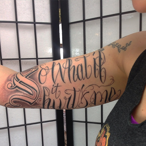 Explore women arm tattoo ideas, creative tattoo ideas in High Point, available at 21 Aces Tattoo Co.