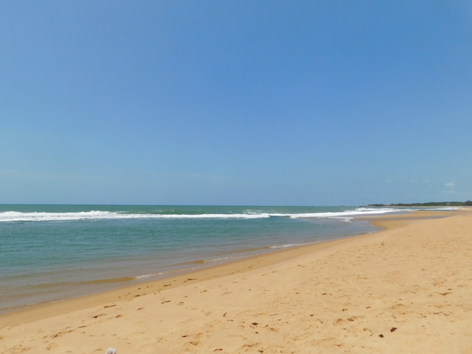 Foto van Kochchama Beach met turquoise puur water oppervlakte