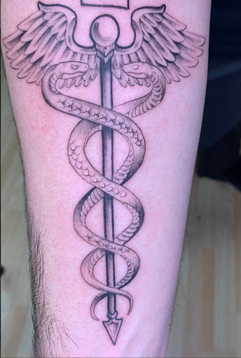 Explore leo tattoo ideas for women, creative tattoo ideas in Kenosha, available at Kenosha Tattoo Company