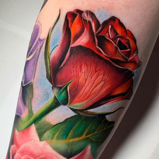 Find palm tattoo ideas for your next unique tattoo in Spokane at Anchored Art Tattoo
