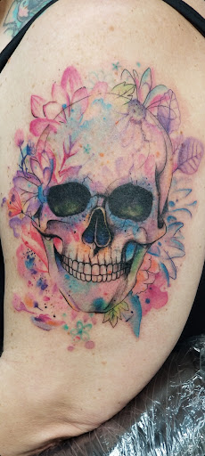 Explore solid black tattoo ideas, creative tattoo ideas in Benton, available at Spectrum Tattoo