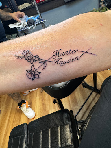 Explore haunted house tattoo ideas, creative tattoo ideas in Waxahachie, available at ExclusivE Tattoo and Barber