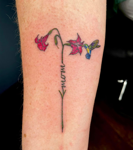 Find tattoo ideas for a mother for your next unique tattoo in Broxton at Seratonin Tattoo Parlor