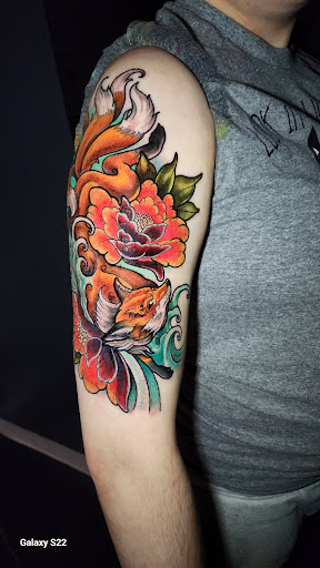 Explore disney thigh tattoo ideas, creative tattoo ideas in Buford, available at Inked Arts Tattoo Studio