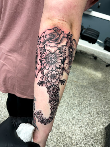 Explore texas longhorn tattoo ideas, creative tattoo ideas in Sanford, available at Luv Ink