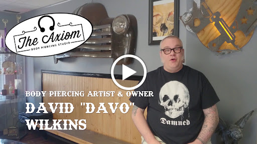 Explore simple silver lining tattoo ideas, creative tattoo ideas in Des Moines, available at Axiom Body Piercing Studio