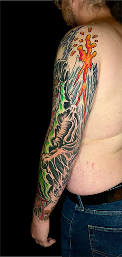 Find tattoo armband ideas for your next unique tattoo in Johnson City at Gold Cross Tattoo Co.