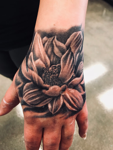 Explore rose and butterfly tattoo ideas, creative tattoo ideas in Cape Coral, available at Raabery Ink Society