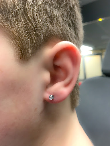 Explore rock music tattoo ideas, creative tattoo ideas in Springfield, available at Body Piercing By Qui Qui