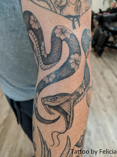 Explore big tattoo ideas female, creative tattoo ideas in Fort Myers, available at Tiger Lotus Tattoo and Piercing