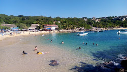 Fotografie cu Playa Manzanillo înconjurat de munți