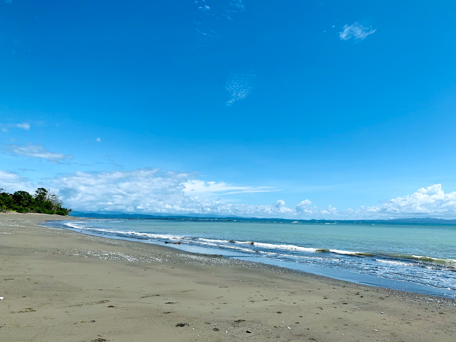 Foto von Playa Tamales mit brauner sand Oberfläche