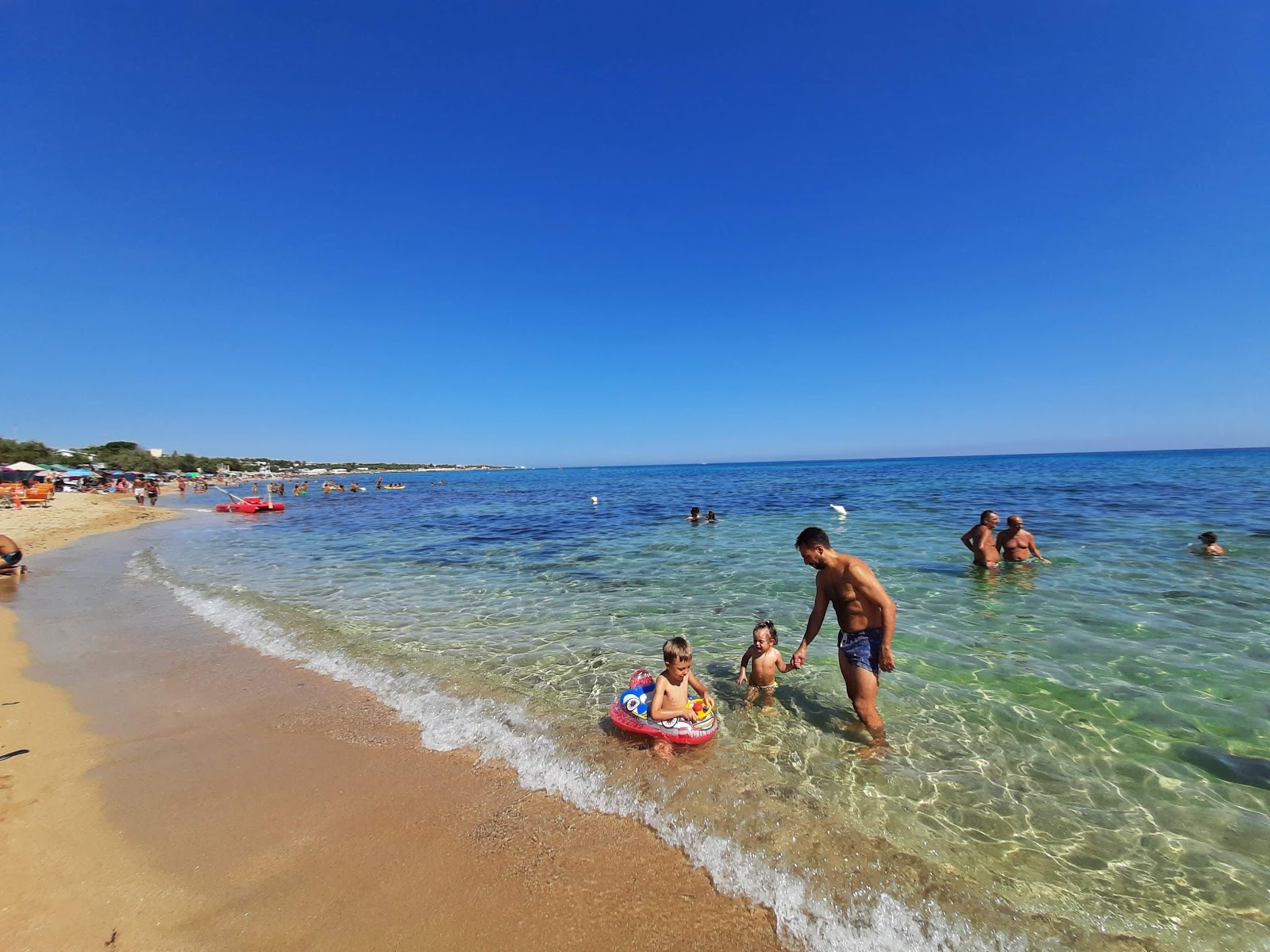 Φωτογραφία του Spiaggia delle Dune με μπεζ άμμος επιφάνεια