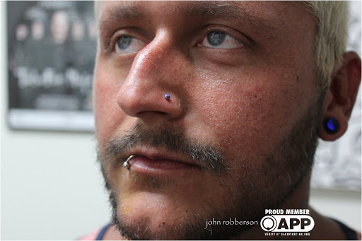 Explore paranormal tattoo ideas, creative tattoo ideas in Fort Myers, available at Tiger Lotus Tattoo and Piercing