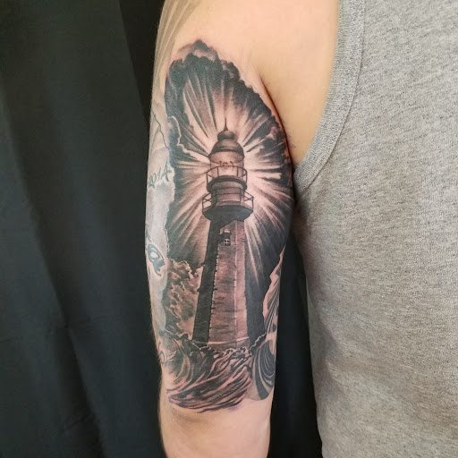 Explore neck tattoo ideas male, creative tattoo ideas in Newburgh, available at Shangri-Las Tattoo Emporium