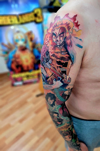 Explore unique sleeve tattoo ideas for females, creative tattoo ideas in Benton, available at Spectrum Tattoo