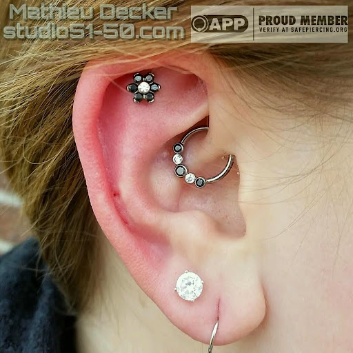 Explore tattoo ideas for wrist for guys, creative tattoo ideas in Kearney, available at Studio 5150 Piercing & Fine Jewelry