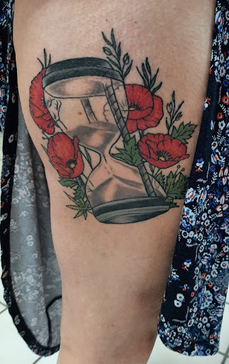 Find in between boob tattoo ideas for your next unique tattoo in Grand Ledge at Van Gogh Tattoos