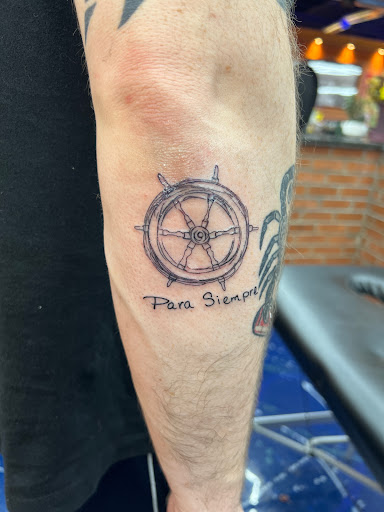 Find earth tattoo ideas for your next unique tattoo in Virginia Beach at Blue Horseshoe Tattoo & Piercing
