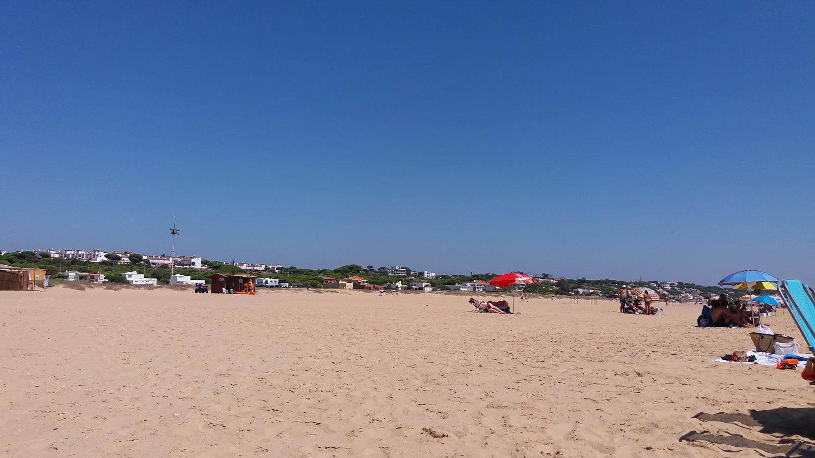Foto di Spiaggia di Mazagon con parzialmente pulito livello di pulizia