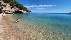 Foto von Spiaggia di Portopiatto und seine wunderschöne Landschaft